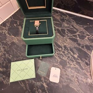 Black leather strap watch